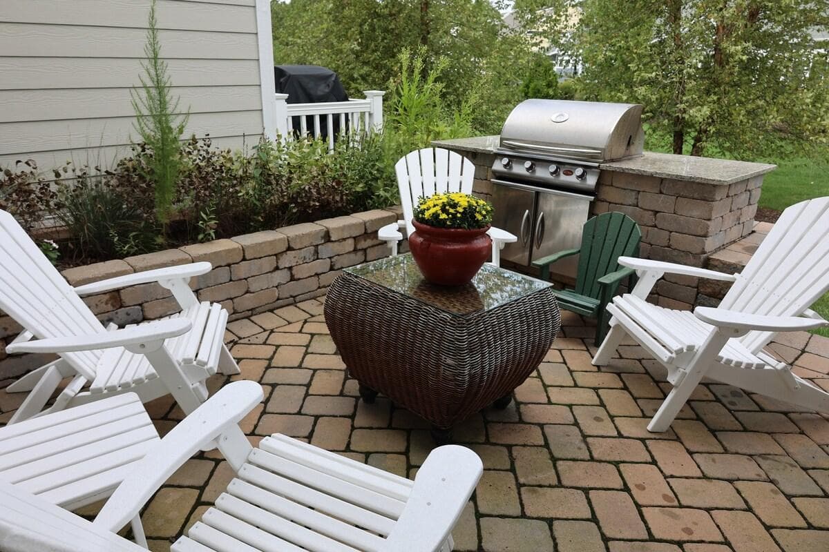 This private patio features a built in gas grill with a granite countertop. It is perfect for a barbecue.